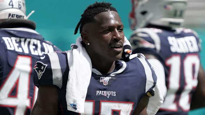 New England Patriots wide receiver Antonio Brown (17) watches from the sidelines in the second half against the Miami Dolphins at Hard Rock Stadium. The Patriots defeated the Dolphins 43-0.